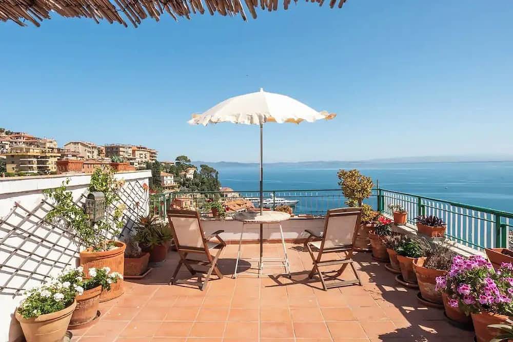 Entire apartment, Argentario Penthouse with terrace overlooking the sea in Porto Santo Stefano, Grosseto Province