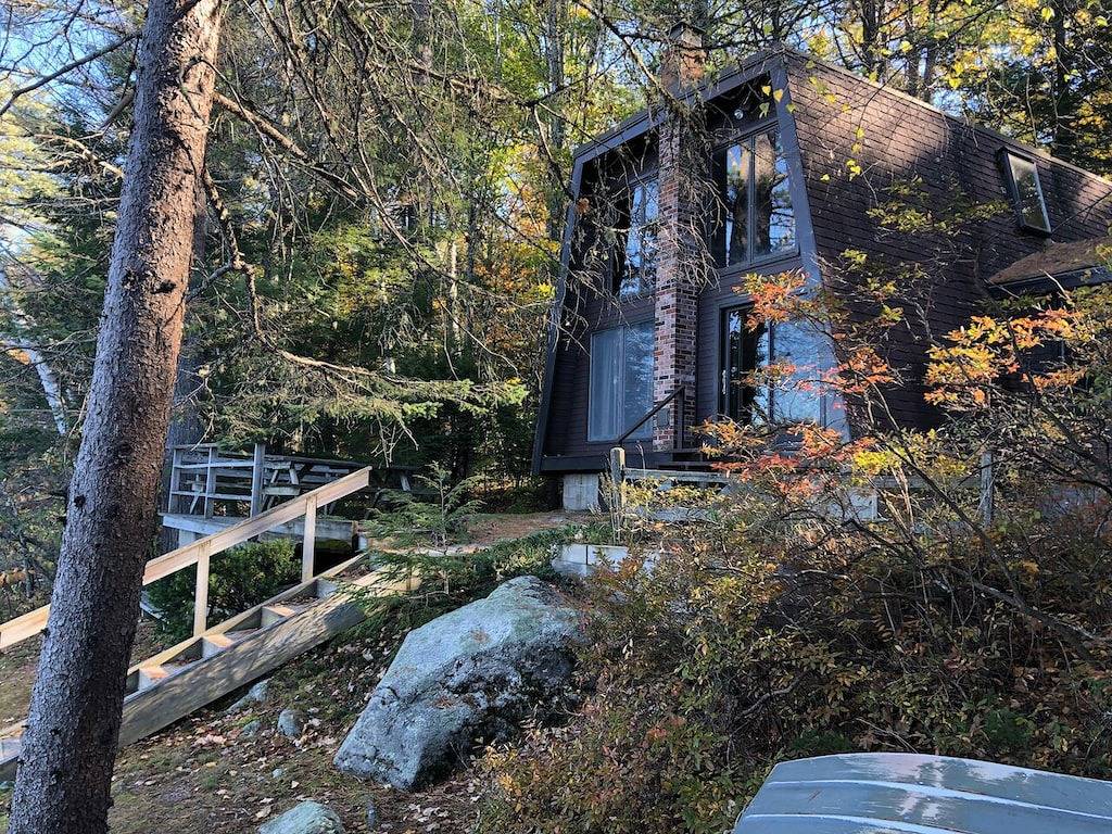 Secluded lakefront cottage with private beach Lakes Region, Denmark Maine in Oxford County