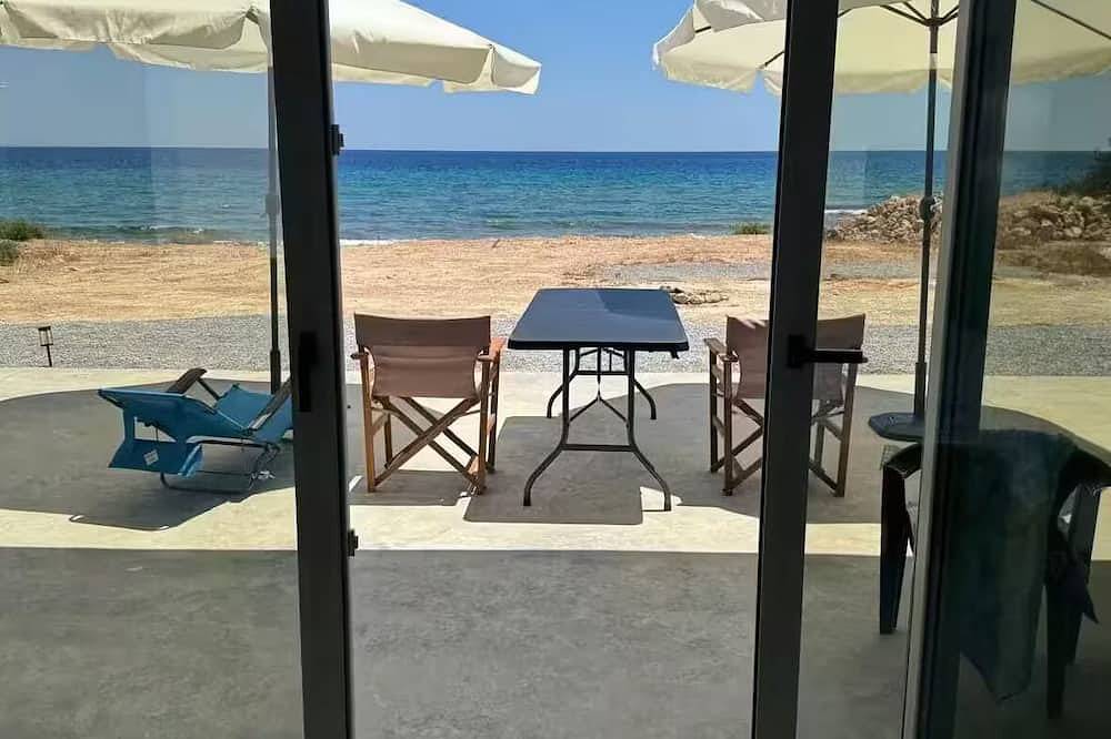 Brand new beachfront house in Koutsouras — 30 steps to crystal-clear water! in Lasithi