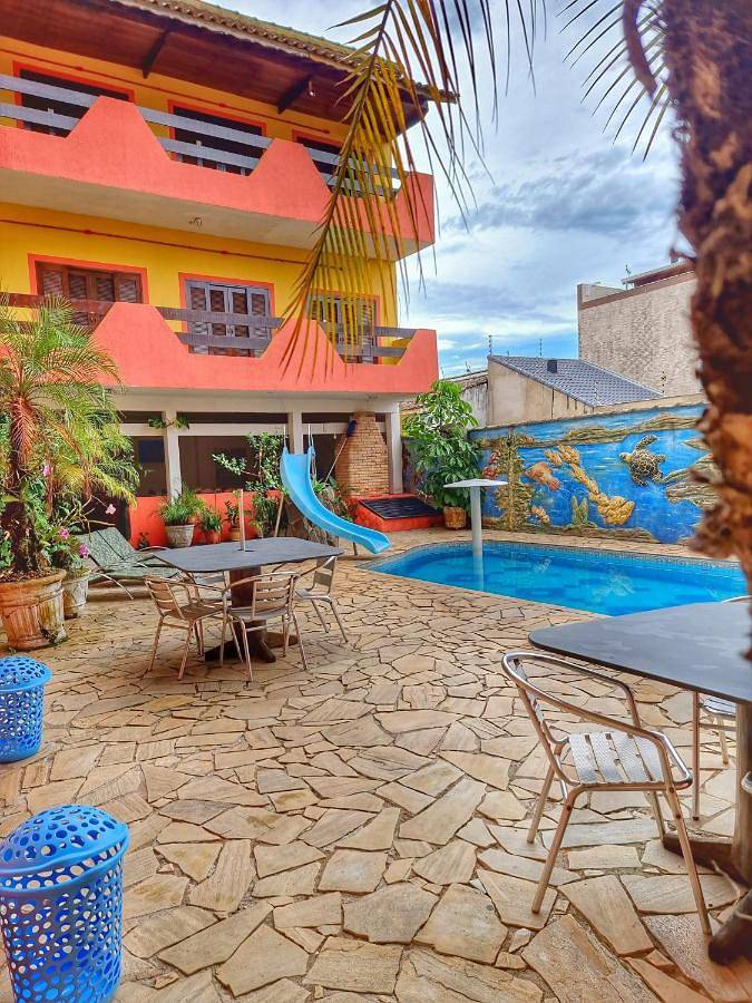 Pousadas para 2 pessoas, com piscina infantil e piscina e ainda vista and balcão em Peruíbe