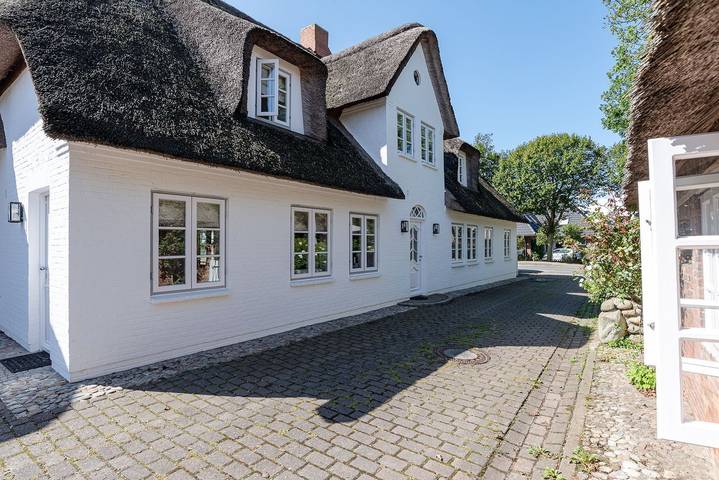 Ferienhaus für 4 Personen, mit Terrasse und Garten sowie Sauna in Oldsum