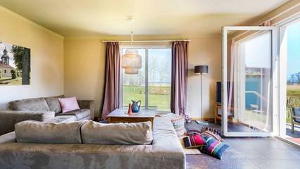 Ferienhaus für 4 Personen, mit Seeblick und Ausblick sowie Garten, mit Haustier in Luckow