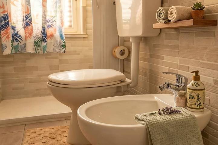 Entire apartment, Cozy Apartment with a Terrace, 2 Minutes from the Beach (Miranaxos) in Giardini-Naxos, Messina Province