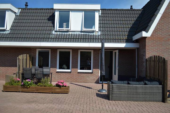 Ferienwohnung für 4 Personen, mit Ausblick und Garten in Petten