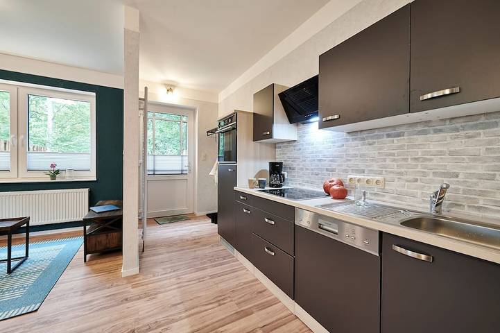 Ferienwohnung für 3 Personen, mit Terrasse und Sauna sowie Garten, mit Haustier in Groß Rheide