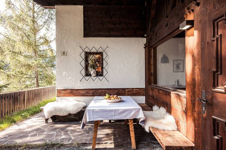 Chalet 'Am Reschensee' mit Seeblick, privater Terrasse und eigenem Garten in Arlund, Graun