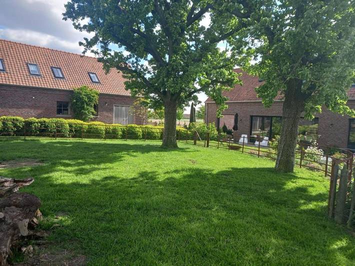 Location de vacances pour 2 personnes, avec Terrasse ainsi que Jardin et Vue à Dentergem