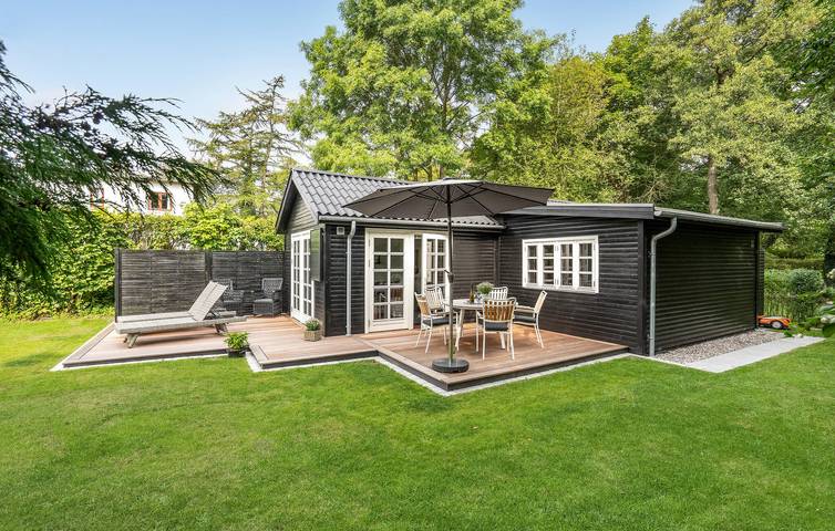 Ferienhaus für 4 Personen, mit Terrasse und Garten in Lyngsbæk Strand