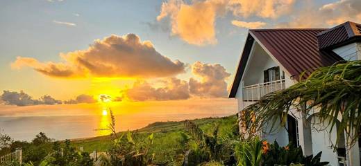 Cottage pour 2 personnes, avec jardin et vue, animaux acceptés aux Avirons