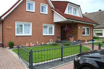 Ferienwohnung für 4 Personen, mit Terrasse und Garten sowie Pool in Ostrhauderfehn