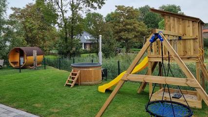 Ferienwohnung für 10 Personen, mit Garten und Ausblick sowie Pool und Sauna, kinderfreundlich in Eckwarden