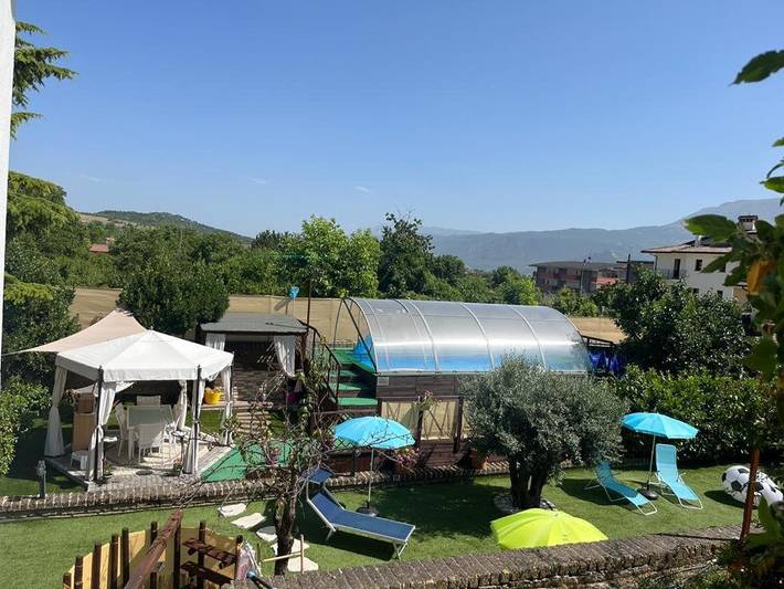Appartement de vacances pour 4 personnes, avec Terrasse et Jardin ainsi que Piscine et Vue dans Paganica