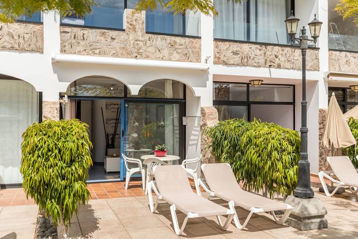 Apartamento entero, Apartamento 'Riviera Peace' cerca de la playa, con piscina compartida y Wi-Fi in Playa del Cura, Mogán