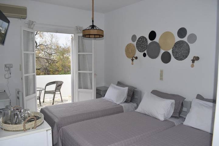 Maison d’hôte pour 3 personnes, avec Balcon et Terrasse ainsi que Jardin et Vue dans Náoussa - 4
