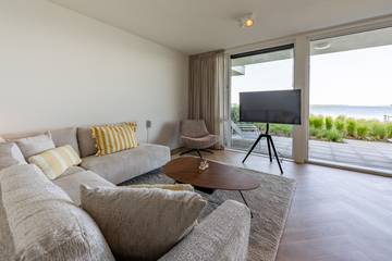 Ferienhaus für 4 Personen, mit Seeblick und Balkon/Terrasse sowie Terrasse in Zeeland