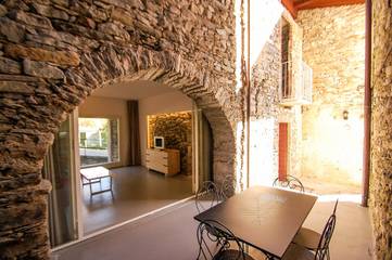 Ferienwohnung für 4 Personen, mit Ausblick und Garten sowie Terrasse und Seeblick am Lago Maggiore