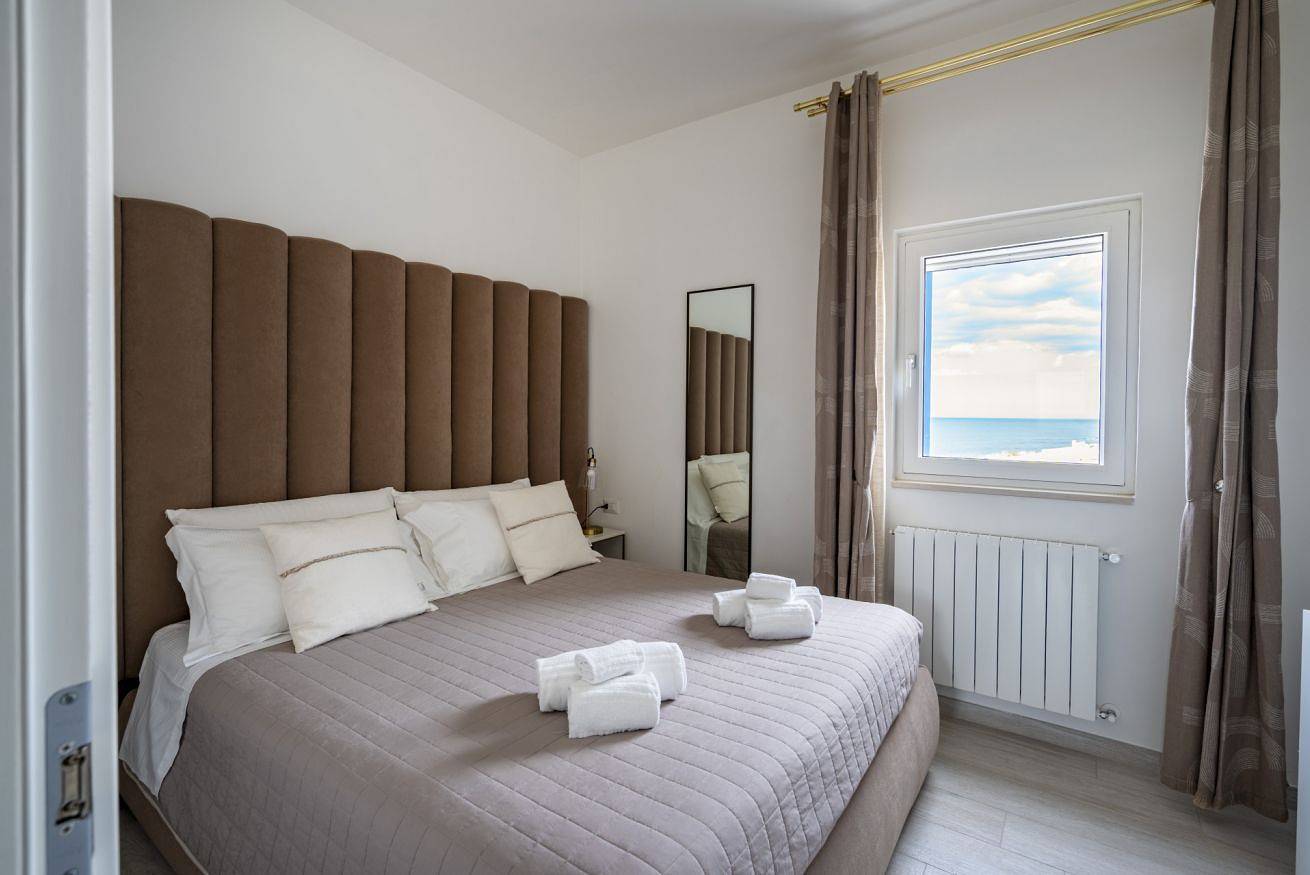 Apartamento entero, Terra | 2-Bedroom Suite with Shared Kitchen & Balcony – Seafront Location in Polignano a Mare, Region de Bari