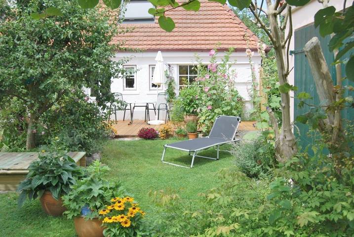 Ferienwohnung für 3 Personen, mit Terrasse und Garten sowie Ausblick
