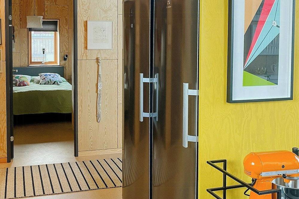 Modernes Holzhaus zwischen Apfelbäumen mit Meerblick in Kivik, Österlen