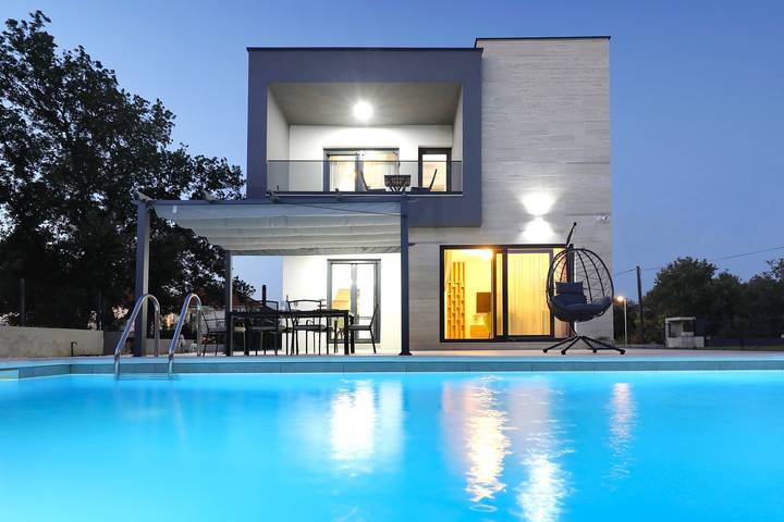 Ferienhaus für 7 Personen, mit Garten