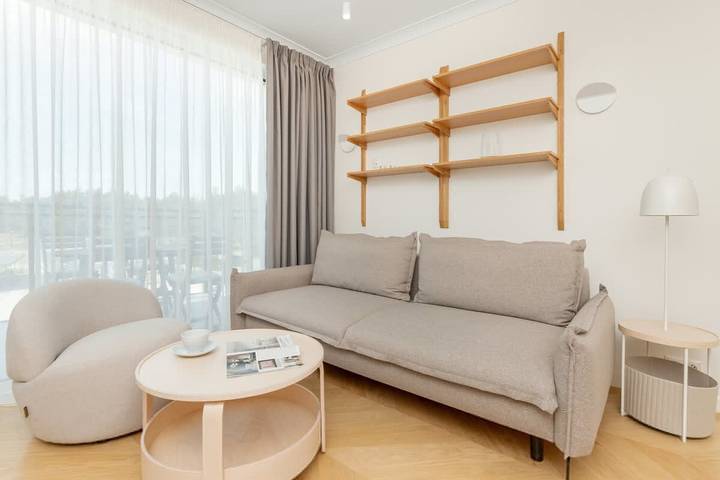Ferienwohnung für 5 Personen, mit Terrasse und Seeblick in Leba