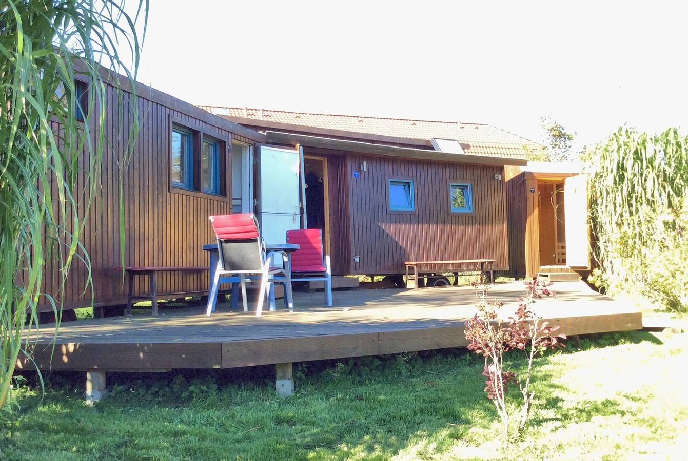 Mobilheim 'Traumwagen An Der Mühle' mit Privatterrasse, Gemeinschaftsgarten und Wi-Fi in Nordermeldorf, Dithmarschen