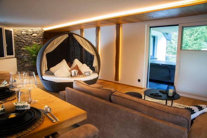 Appartement de vacances pour 2 personnes, avec sauna ainsi que jardin et vue