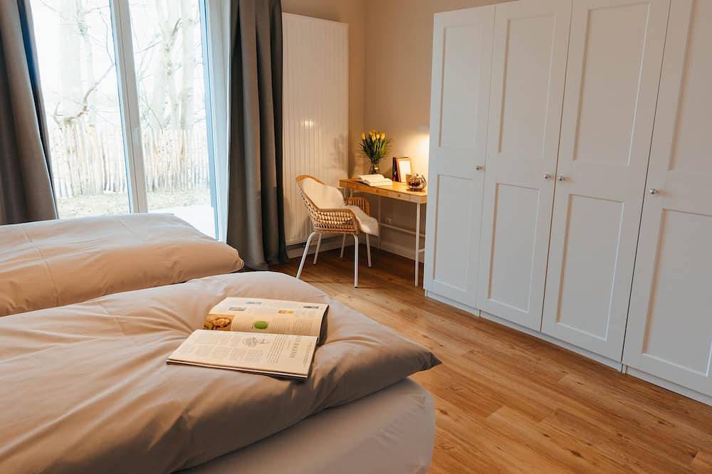 Ganze Wohnung, The vacation apartment with three terraces is located between the forest and the lake in Ratzeburg, Ratzeburger See