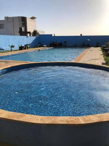 Location de vacances pour 3 personnes, avec piscine ainsi que bassin pour enfant et terrasse, animaux acceptés dans Ain Cheggag