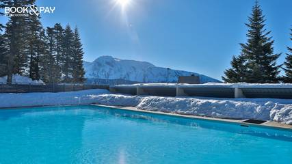 Appartement de vacances pour 8 personnes, avec piscine ainsi que balcon et jacuzzi, animaux acceptés dans l' Isère