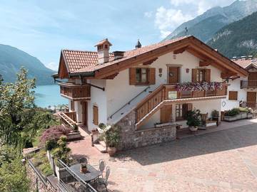 Gîte pour 8 personnes, avec jardin ainsi que vue sur le lac et vue à Molveno