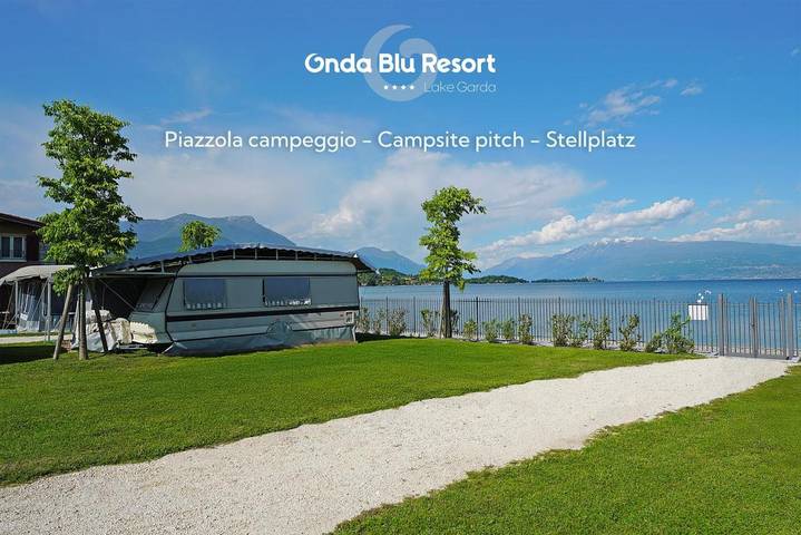 Camping per 6 persone, con giardino e piscina nonché piscina per bambini e vista lago, adatto a famiglie con bambini in Manerba del Garda