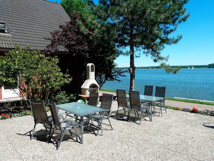 Ferienwohnung für 4 Personen, mit Terrasse und Whirlpool sowie Sauna und Garten, mit Haustier in Schlei