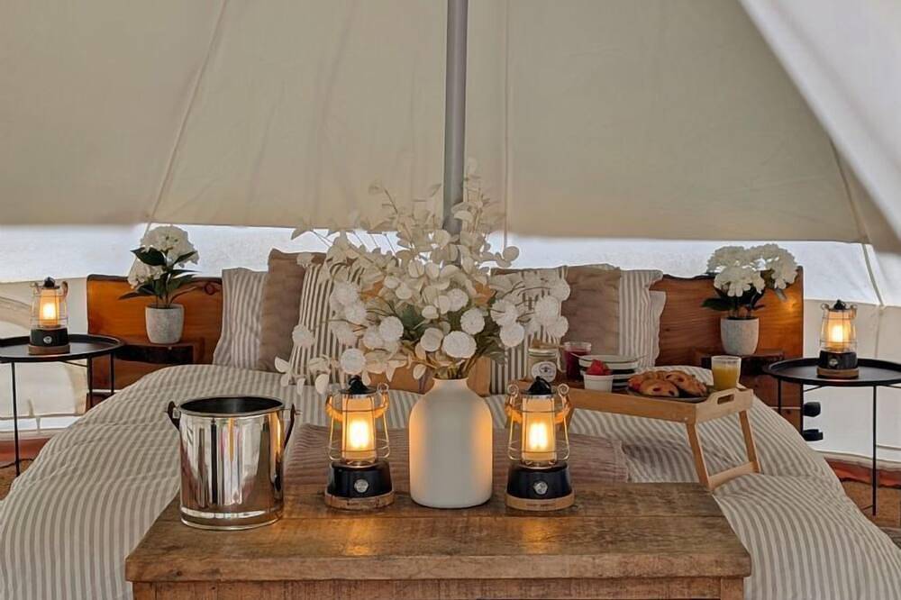 Bell tent in ultimate luxury with a wood fired hot tub, super king size bed in Stafford, Staffordshire