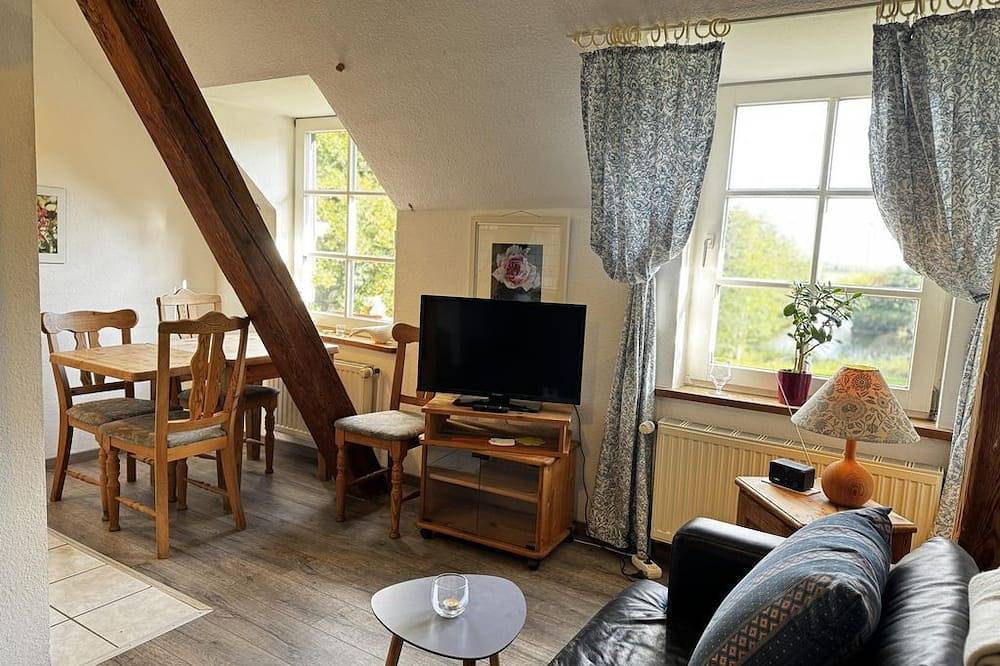 Ganze Wohnung, Ferienwohnung Seeblick - Lüttje Paradies in Ruhwarden, Butjadingen