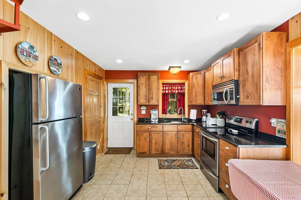 Winnipesaukee Waterfront Chalet with Sandy Beach Private Dock and Fire Pit in Moultonborough, Lake Winnipesaukee