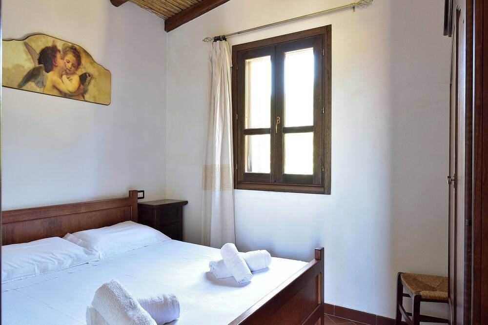 Villa with exclusive garden, 240 meters from the beach, sea and mountain views. in Tancau sul Mare, Lotzorai