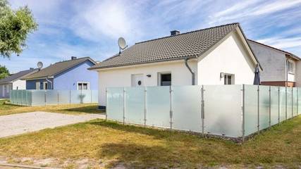 Ferienwohnung für 4 Personen, mit Garten und Terrasse sowie Seeblick, kinderfreundlich in Pepelow