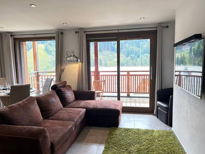 Ganze Wohnung, Modernes Apartment gegenüber den Pisten - Balkon, 1,3 km vom Zentrum entfernt, 4 Schlafplätze in Les Gets, Les Portes du Soleil