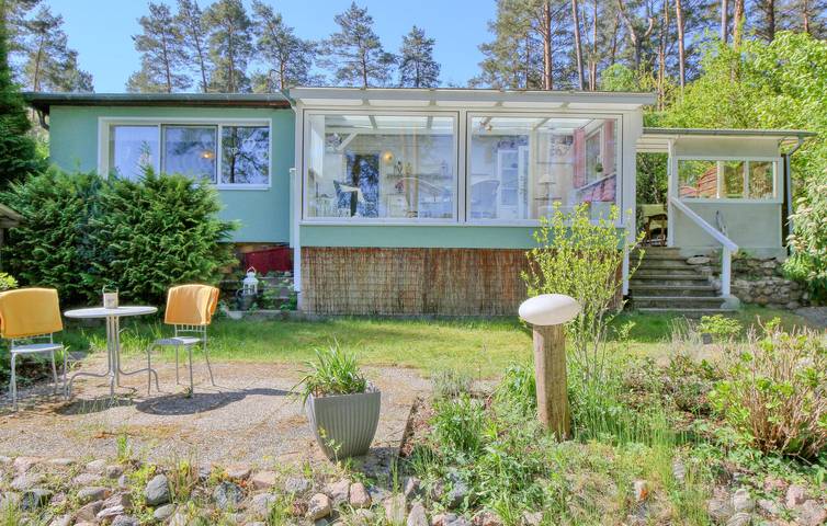 Ferienhaus für 3 Personen, mit Terrasse und Garten sowie Seeblick