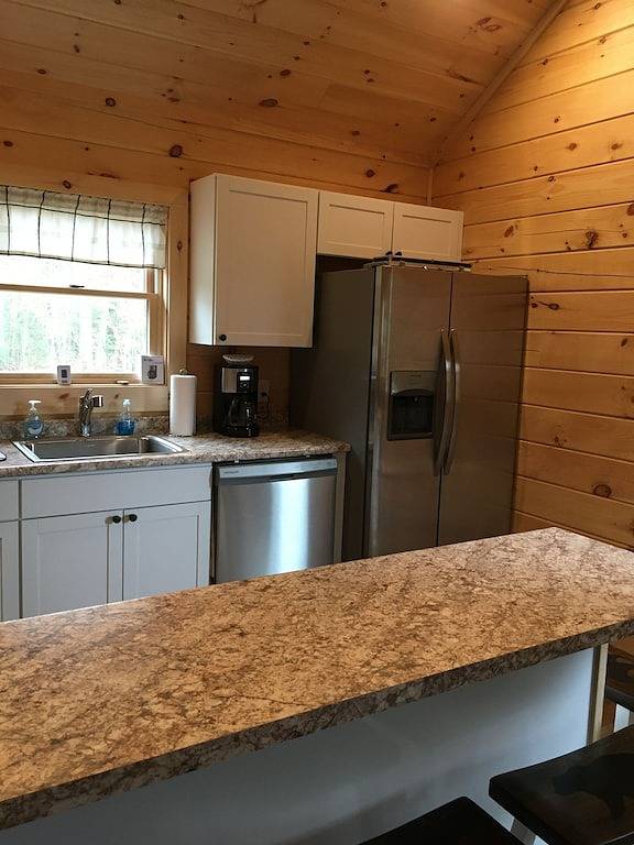 New log cabin in Coös County