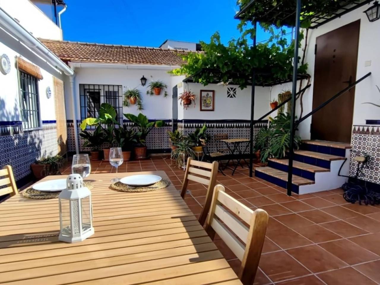 Entire apartment, Charming Andalusian house near beach with private patio in Málaga (Este), Malaga