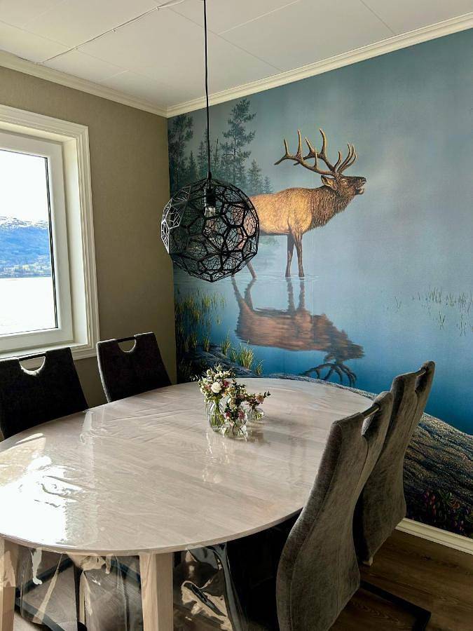 Ferienhaus für 9 Personen, mit Balkon und Terrasse sowie Garten und Ausblick in Etne