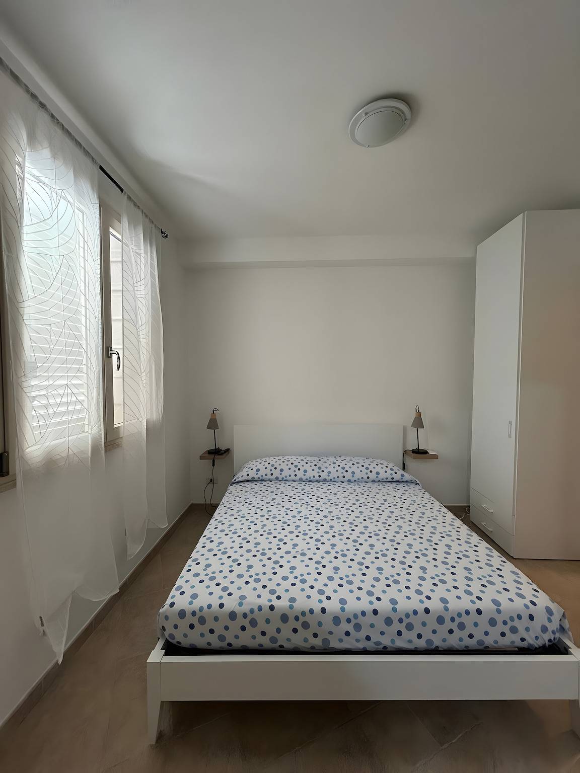 Room 'L'Angolo- Camera 2' with Shared Terrace, Wi-Fi and Air Conditioning in Porto Torres, Sassari Province