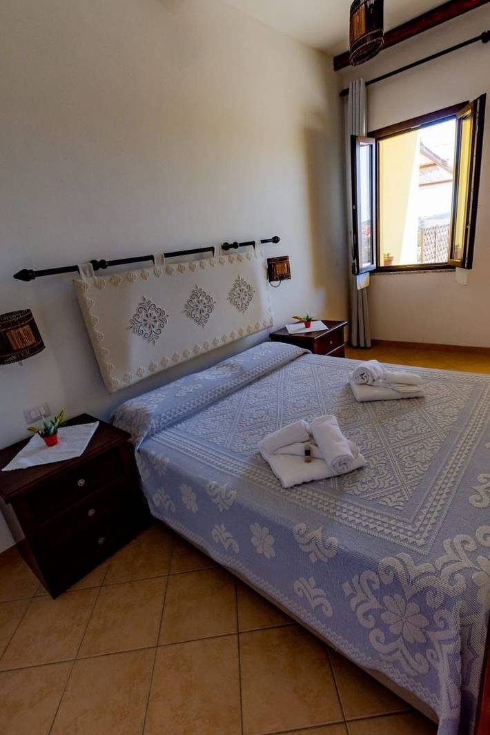 Ganze Wohnung, Charmantes Apartment mit Pool & Garten - Nähe zu Attraktionen in Sassari, Nurra