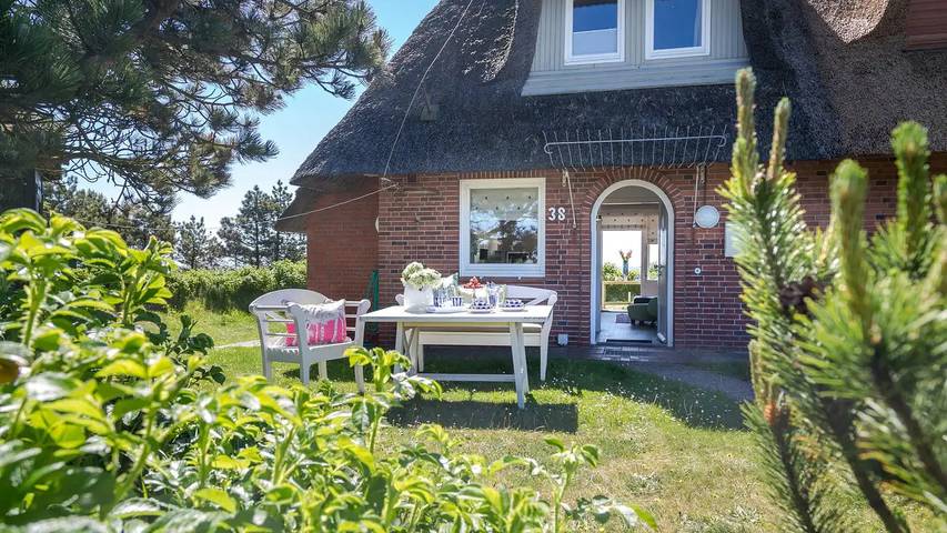 Ferienhaus mit Meerblick für 4 Personen, mit Garten