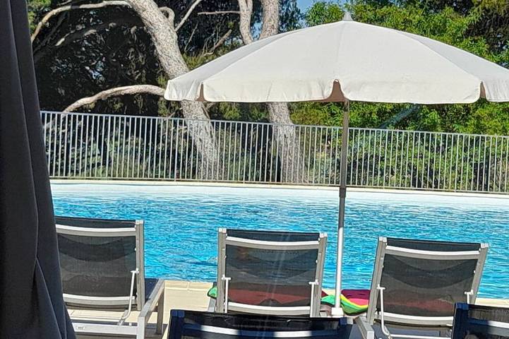 Appartement de vacances pour 4 personnes, avec Balcon ainsi que Jardin et Piscine