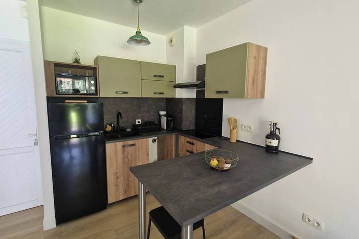 Appartement de vacances pour 4 personnes, avec piscine ainsi que jardin et terrasse