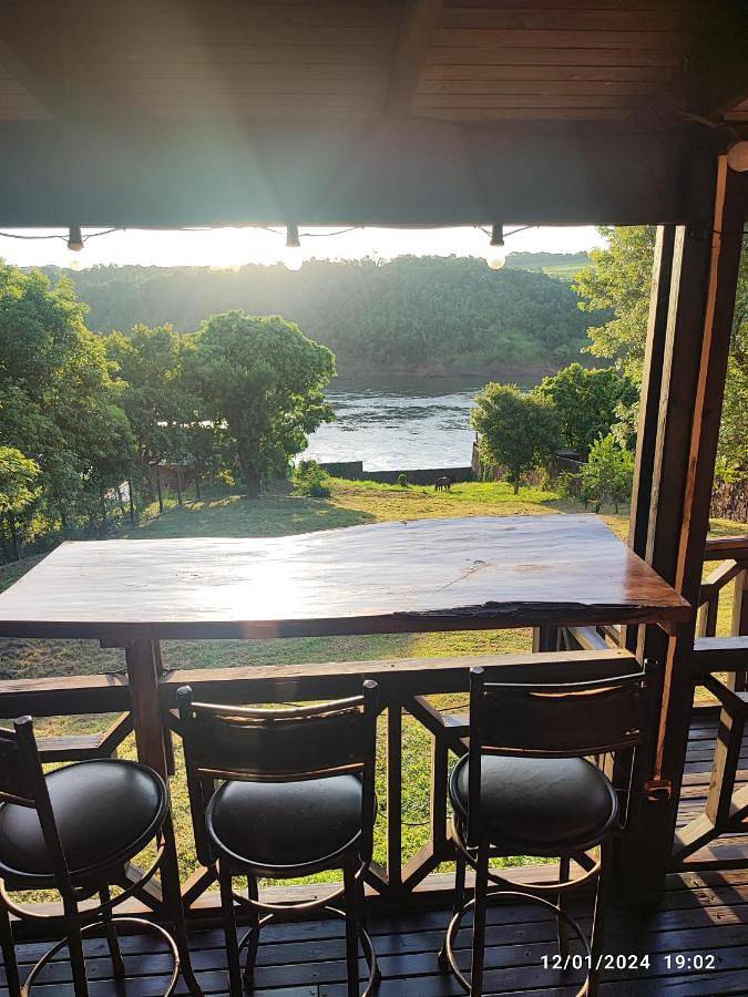 Location de vacances pour 6 personnes, avec jardin ainsi que balcon et vue, adapté aux familles à Puerto Iguazú