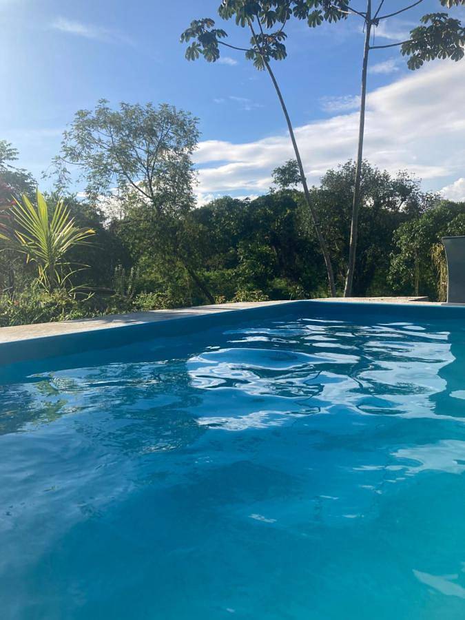 Casas e apartamentos de temporada para 20 pessoas, com piscina e vista para o lago e ainda jardim and vista em Itaboraí